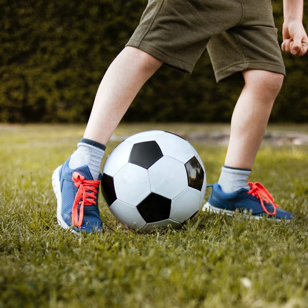 kids playing with soccer ball
